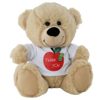 Teddy bear wearing a white shirt with a red apple graphic and 'Thank You' text on a white background
