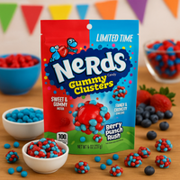 Nerds Gummy Clusters packaging with colorful candies on a wooden surface.