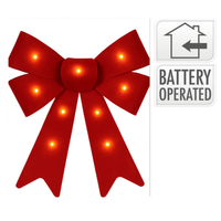 Red LED bow with battery operated indicator on a white background
