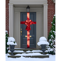 Red metallic door bow with long ribbon for holiday decoration

