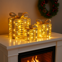 Decorative gold gift boxes with 45 LED lights on a mantelpiece 