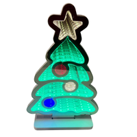 Festive LED Christmas tree light with infinity mirror effect
