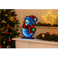 Battery operated snowman light for indoor holiday display
