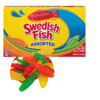 Swedish Fish assorted candy with packaging on a white background
